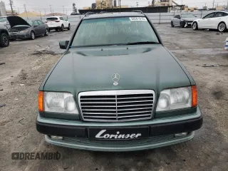 1993 Mercedes-Benz 300 with VIN WDBEA92E7PF259851, listed as a Copart auction lot 50561015 with 214,346 mi miles and Salvage Title. Bid and sale history available at DreamBid. Image 5.