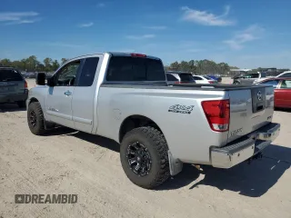 2005 Nissan Titan SE with VIN 1N6BA06B65N548901, listed as a Copart auction lot 82134924 with 167,374 mi miles and Clean title. Bid and sale history available at DreamBid. Image 2.