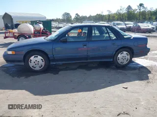 1997 Oldsmobile Cutlass Supreme S z VIN 1G3WH52M3VF338576, wystawiony jako IAAI lot #40573770 z przebiegiem 105 806 mil mil oraz . Historia ofert i sprzedaży dostępna na DreamBid. Obrazek 14.