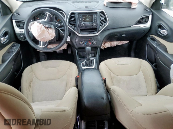 2015 Jeep Cherokee Sport with VIN 1C4PJLAB9FW632112, listed as a Copart auction lot 63265295 with 83,301 mi miles and Salvage title. Bid and sale history available at DreamBid. Image 8.