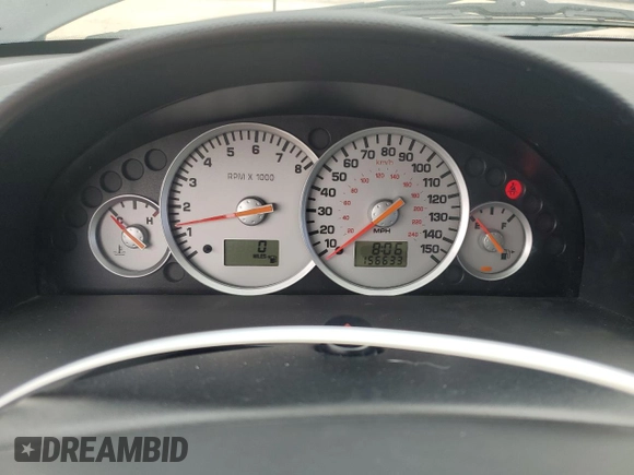 2002 Mercury Cougar z VIN 1ZWFT61L525609449, wystawiony jako Copart lot #72945474 z przebiegiem 156 633 mil mil oraz Szkoda całkowita • Salvage title. Historia ofert i sprzedaży dostępna na DreamBid. Obrazek 9.