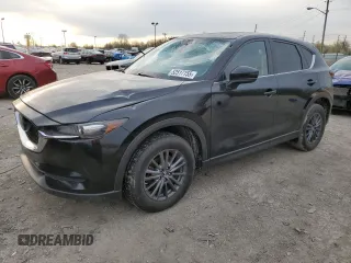 2020 Mazda CX-5 Touring z VIN JM3KFBCM6L1807713, wystawiony jako Copart lot #52517155 z przebiegiem 122 977 mil mil oraz Szkody całkowita. Historia ofert i sprzedaży dostępna na DreamBid. Obrazek 1.