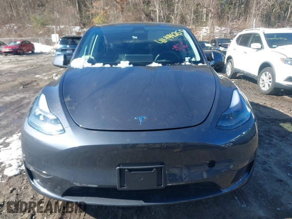 2023 Tesla Model Y Long Range with VIN 7SAYGAEE9PF905943, listed as a IAAI auction lot 41444255 with 11,179 mi miles and . Bid and sale history available at DreamBid. Image 11.