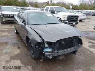 2014 Dodge Charger SE with VIN 2C3CDXBG8EH357664, listed as a IAAI auction lot 41860609 with 94,918 mi miles. Bid and sale history available at carsss.com. Image 1.