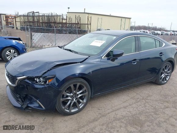 2016 Mazda Mazda6 i Grand Touring with VIN JM1GJ1W57G1486962, listed as a IAAI auction lot 41813471 with 64,078 mi miles. Bid and sale history available at carsss.com. Image 17.