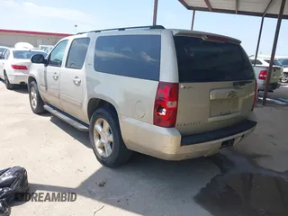 2007 Chevrolet Suburban LS with VIN 1GNFC16J77R264823, listed as a IAAI auction lot 42680813 with Not provided miles and . Bid and sale history available at DreamBid. Image 3.