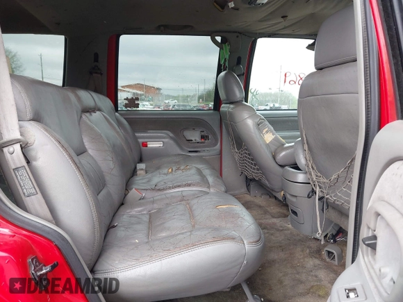1998 GMC Yukon with VIN 1GKEK13R0WJ703105, listed as a IAAI auction lot 41980869 with 302,546 mi miles. Bid and sale history available at carsss.com. Image 8.