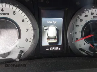 2015 Toyota Sienna SE with VIN 5TDXK3DC0FS657546, listed as a IAAI auction lot 42183750 with 137,157 mi miles and . Bid and sale history available at DreamBid. Image 7.