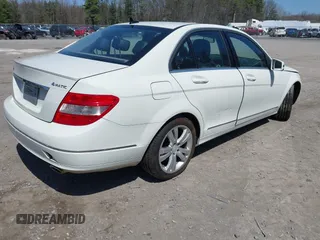 2011 Mercedes-Benz C with VIN WDDGF8BBXBR174317, listed as a IAAI auction lot 42116532 with 121,227 mi miles. Bid and sale history available at carsss.com. Image 4.