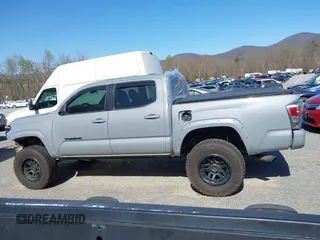 2020 Toyota Tacoma SR5 z VIN 5TFCZ5AN5LX229019, wystawiony jako IAAI lot #41907694 z przebiegiem 79 355 mil mil oraz . Historia ofert i sprzedaży dostępna na DreamBid. Obrazek 15.