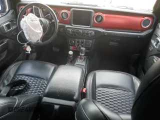 2021 Jeep Wrangler Unlimited Rubicon z VIN 1C4HJXFN1MW793064, wystawiony jako Copart lot #55643305 z przebiegiem 51 944 mil mil oraz Szkoda całkowita • Salvage title. Historia ofert i sprzedaży dostępna na DreamBid. Obrazek 8.