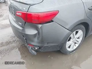 2014 Acura ILX Hybrid Technology z VIN 19VDE3F75EE300312, wystawiony jako IAAI lot #41608572 z przebiegiem 126 974 mil mil oraz . Historia ofert i sprzedaży dostępna na DreamBid. Obrazek 6.