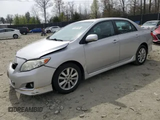2010 Toyota Corolla with VIN 2T1BU4EEXAC457317, listed as a Copart auction lot 51596195 with 203,296 mi miles and Salvage Title. Bid and sale history available at carsss.com. Image 1.