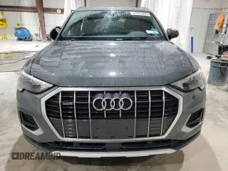 2022 Audi Q3 Premium with VIN WA1AUCF33N1002302, listed as a Copart auction lot 51973985 with 49,886 mi miles and Salvage title. Bid and sale history available at DreamBid. Image 5.