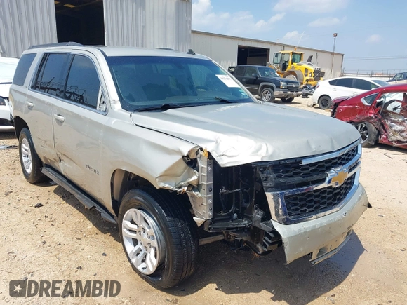 2015 Chevrolet Tahoe LS with VIN 1GNSCAKC9FR294832, listed as a IAAI auction lot 39274877 with 126,932 mi miles and . Bid and sale history available at DreamBid. Image 1.