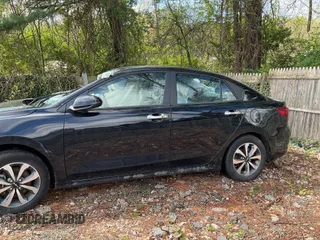 2022 Kia Rio S with VIN 3KPA24AD9NE431636, listed as a IAAI auction lot 42200323 with 36,309 mi miles and . Bid and sale history available at carsss.com. Image 2.