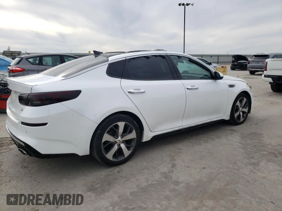 2019 Kia Optima LX z VIN 5XXGT4L37KG280102, wystawiony jako Copart lot #49186485 z przebiegiem 127 458 mil mil oraz Czysty tytuł • Clean title. Historia ofert i sprzedaży dostępna na DreamBid. Obrazek 3.