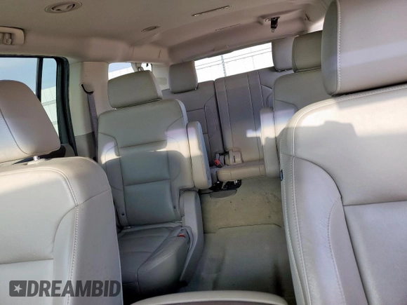 2017 Chevrolet Suburban LT z VIN 1GNSCHKC3HR169174, wystawiony jako Copart lot #59035415 z przebiegiem 64 243 mil mil oraz Szkoda całkowita • Salvage title. Historia ofert i sprzedaży dostępna na DreamBid. Obrazek 10.