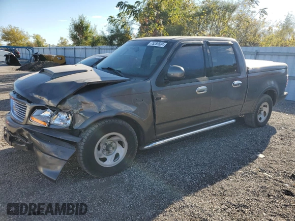 2002 Ford F-150 Harley Davidson with VIN 1FTRW07362KC77880, listed as a Copart auction lot 75259594 with 103,591 mi miles and Salvage Title. Bid and sale history available at carsss.com. Image 1.