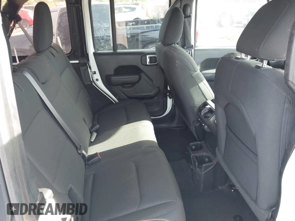 2023 Jeep Wrangler Willys with VIN 1C4HJXDG5PW566145, listed as a IAAI auction lot 41912872 with 50,290 mi miles and . Bid and sale history available at DreamBid. Image 8.