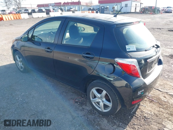 2013 Toyota Yaris L with VIN JTDKTUD35DD548148, listed as a IAAI auction lot 41939847 with 336,231 mi miles. Bid and sale history available at carsss.com. Image 3.