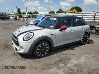 2017 MINI Hardtop 4 Door Cooper S with VIN WMWXU3C55H2D33015, listed as a Copart auction lot 63756435 with 63,596 mi miles and Salvage title. Bid and sale history available at DreamBid. Image 1.