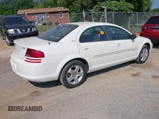 2001 Dodge Stratus z VIN 1B3EJ56U81N691181, wystawiony jako IAAI lot #42466657 z przebiegiem 140 236 mil mil oraz . Historia ofert i sprzedaży dostępna na DreamBid. Obrazek 4.