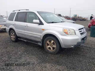 2007 Honda Pilot EX with VIN 2HKYF184X7H511937, listed as a IAAI auction lot 40992172 with 250,940 mi miles. Bid and sale history available at carsss.com. Image 1.