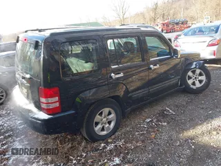 2012 Jeep Liberty Sport with VIN 1C4PJMAK0CW209498, listed as a IAAI auction lot 41881406 with 127,855 mi miles. Bid and sale history available at carsss.com. Image 4.