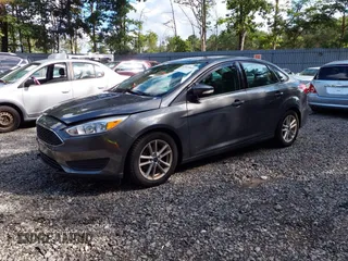 2018 Ford Focus SE z VIN 1FADP3FE0JL284107, wystawiony jako IAAI lot #42815845 z przebiegiem 110 155 mil mil oraz . Historia ofert i sprzedaży dostępna na DreamBid. Obrazek 17.