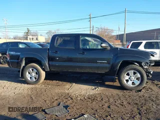 2015 Toyota Tacoma with VIN 3TMLU4EN4FM190968, listed as a IAAI auction lot 41749985 with 152,668 mi miles and . Bid and sale history available at DreamBid. Image 13.