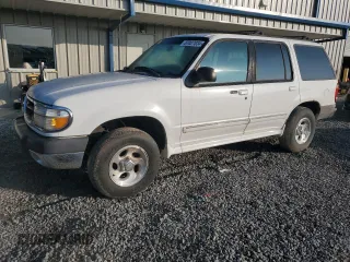 1999 Ford Explorer XL z VIN 1FMZU34XXXUB80803, wystawiony jako Copart lot #87027834 z przebiegiem 222 864 mil mil oraz Szkody całkowita. Historia ofert i sprzedaży dostępna na DreamBid. Obrazek 1.
