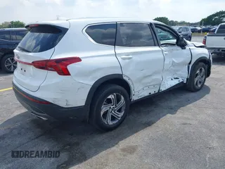 2023 Hyundai Santa Fe SE z VIN 5NMS14AJ6PH631267, wystawiony jako IAAI lot #42053761 z przebiegiem 17 880 mil mil oraz . Historia ofert i sprzedaży dostępna na DreamBid. Obrazek 4.