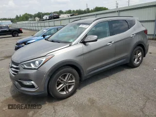 2018 Hyundai Santa Fe 2.4L with VIN 5NMZUDLB5JH075942, listed as a Copart auction lot 59537235 with 74,046 mi miles and Salvage title. Bid and sale history available at DreamBid. Image 1.