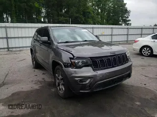 2021 Jeep Grand Cherokee 80th Anniversary z VIN 1C4RJEBG7MC679667, wystawiony jako Copart lot #54167225 z przebiegiem 77 268 mil mil oraz Szkoda całkowita • Salvage title. Historia ofert i sprzedaży dostępna na DreamBid. Obrazek 14.