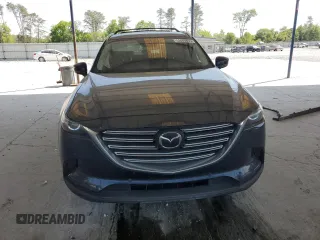 2021 Mazda CX-9 Touring with VIN JM3TCACY7M0528188, listed as a Copart auction lot 53880865 with 63,581 mi miles and Salvage title. Bid and sale history available at DreamBid. Image 5.