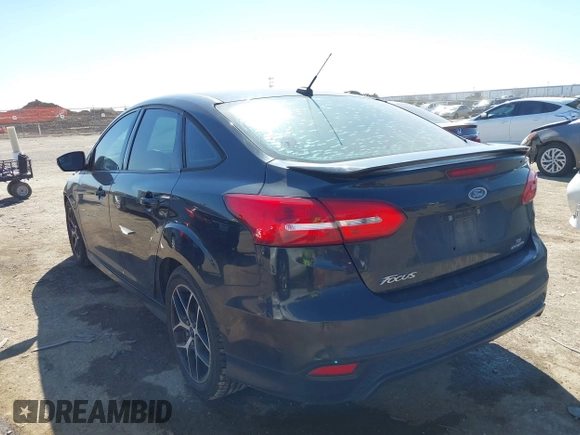 2015 Ford Focus SE with VIN 1FADP3F24FL313640, listed as a IAAI auction lot 41651845 with 146,390 mi miles. Bid and sale history available at carsss.com. Image 3.