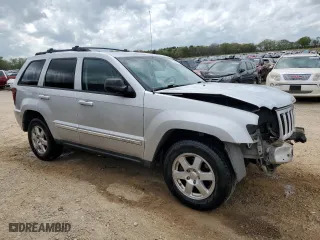 2010 Jeep Grand Cherokee Laredo with VIN 1J4PS4GK8AC146969, listed as a Copart auction lot 51705335 with 219,069 mi miles and Salvage Title. Bid and sale history available at carsss.com. Image 4.