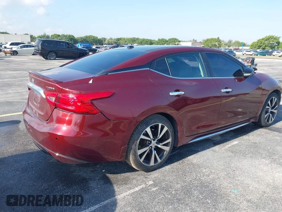 2016 Nissan Maxima SL z VIN 1N4AA6AP2GC402603, wystawiony jako IAAI lot #42132544 z przebiegiem 189 990 mil mil oraz . Historia ofert i sprzedaży dostępna na DreamBid. Obrazek 4.
