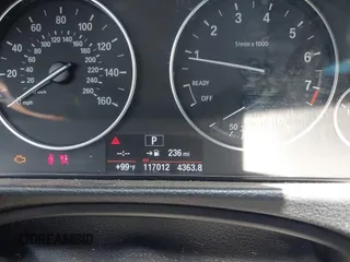 2014 BMW 3 Series 328i with VIN WBA3A5C54EP600398, listed as a IAAI auction lot 42665302 with 117,012 mi miles and . Bid and sale history available at DreamBid. Image 7.