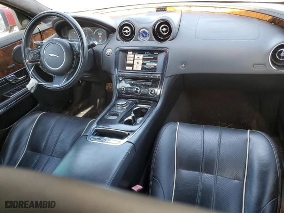 2013 Jaguar XJ with VIN SAJWJ1CD9D8V48888, listed as a Copart auction lot 77744654 with NaN miles and Clean Title. Bid and sale history available at carsss.com. Image 8.