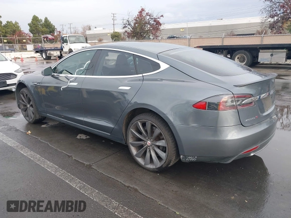 2013 Tesla Model S с VIN 5YJSA1CG5DFP06411, выставлен на аукционе IAAI как лот 41079914 с пробегом 266 968 миль миль и . История ставок и продаж доступна на DreamBid. Изображение 3.