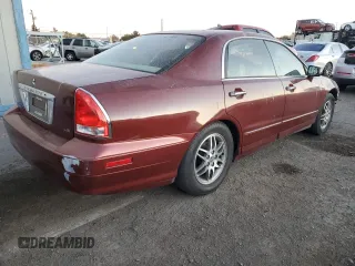 2002 Mitsubishi Diamante LS z VIN 6MMAP67P62T008326, wystawiony jako Copart lot #44698555 z przebiegiem 75 695 mil mil oraz Szkody całkowita. Historia ofert i sprzedaży dostępna na DreamBid. Obrazek 3.