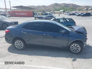 2019 Toyota Corolla L z VIN 2T1BURHE4KC215942, wystawiony jako IAAI lot #42104097 z przebiegiem 87 020 mil mil oraz . Historia ofert i sprzedaży dostępna na DreamBid. Obrazek 13.