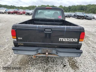 2000 Mazda B-Series 2WD Truck SX with VIN 4F4YR12C2YTM25985, listed as a Copart auction lot 71353824 with 247,907 mi miles and Salvage Title. Bid and sale history available at carsss.com. Image 6.