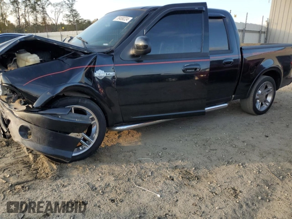 2002 Ford F-150 Harley Davidson with VIN 1FTRW07342KC24210, listed as a Copart auction lot 78489224 with 203,508 mi miles and Salvage Title. Bid and sale history available at carsss.com. Image 1.