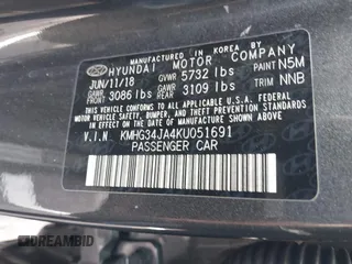 2019 Genesis G90 Premium z VIN KMHG34JA4KU051691, wystawiony jako IAAI lot #42216520 z przebiegiem 91 788 mil mil oraz . Historia ofert i sprzedaży dostępna na DreamBid. Obrazek 9.
