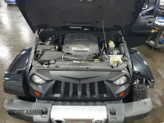 2012 Jeep Wrangler Unlimited Sahara with VIN 1C4BJWEG8CL235893, listed as a Copart auction lot 58195585 with 142,179 mi miles and Salvage title. Bid and sale history available at DreamBid. Image 12.