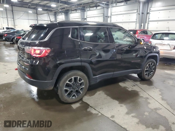 2019 Jeep Compass Trailhawk with VIN 3C4NJDDB4KT647187, listed as a Copart auction lot 50260575 with 63,098 mi miles and Salvage Title. Bid and sale history available at carsss.com. Image 3.