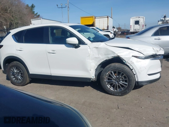 2017 Mazda CX-5 Touring z VIN JM3KFBCL8H0214052, wystawiony jako IAAI lot #41940783 z przebiegiem 120 083 mil mil oraz . Historia ofert i sprzedaży dostępna na DreamBid. Obrazek 12.